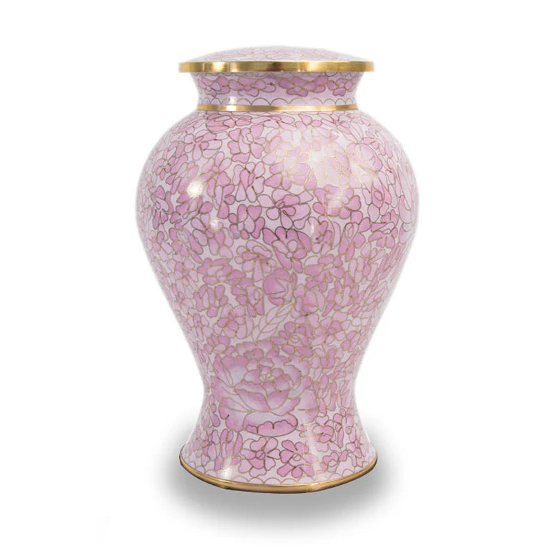 A large cloisonne style cremation urn with pink floral patterns and gold accents on the lid and base.