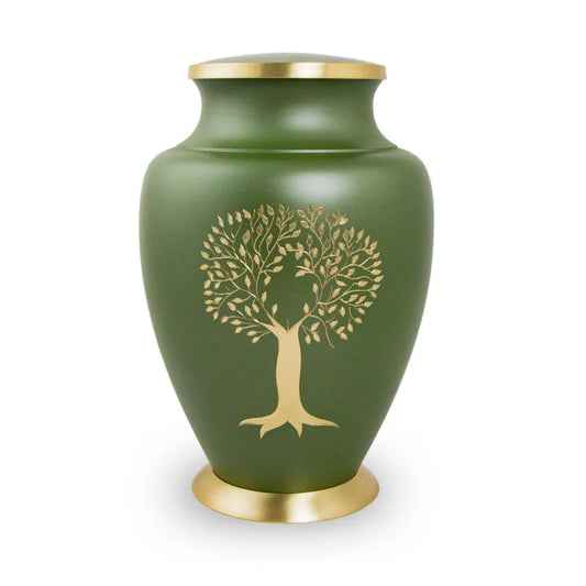 A bronze cremation urn with a dark green finish and a hand engraved tree decorative accent on the front. The urn has a gold-colored lid and base.