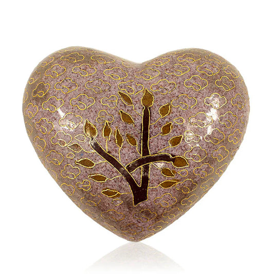 A bronze heart-shaped cloisonne cremation keepsake with a floral pattern and a tree with leaves inlaid on the surface.
