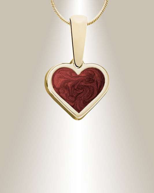 A heart-shaped pendant necklace with a blend of cremated ashes and gemstone-like resin, displayed against a gradient background.