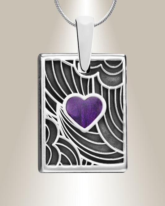 A sterling silver pendant with a heart-shaped inset containing Mulberry colored resin, displayed on a chain.
